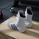 Close-up of adidas Box Hog 2 White boxing shoes showing the mesh upper and lace-up construction