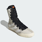 Angled action view highlighting footwork support and stability grey