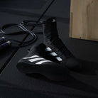 Angled view showing structure and support of adidas boxing shoes