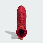 Adidas Box Hog boxing shoes with EVA midsole wedge for stable stance and midfoot support.