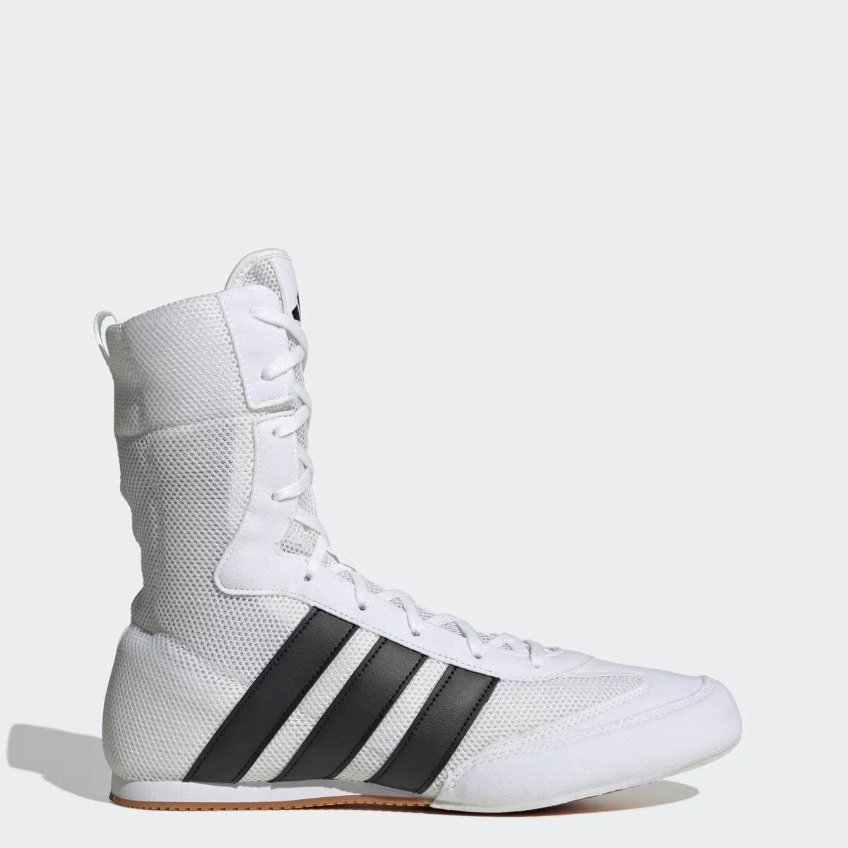 Model wearing adidas Box Hog Classic Cloud White/Core Black boxing shoes during boxing training