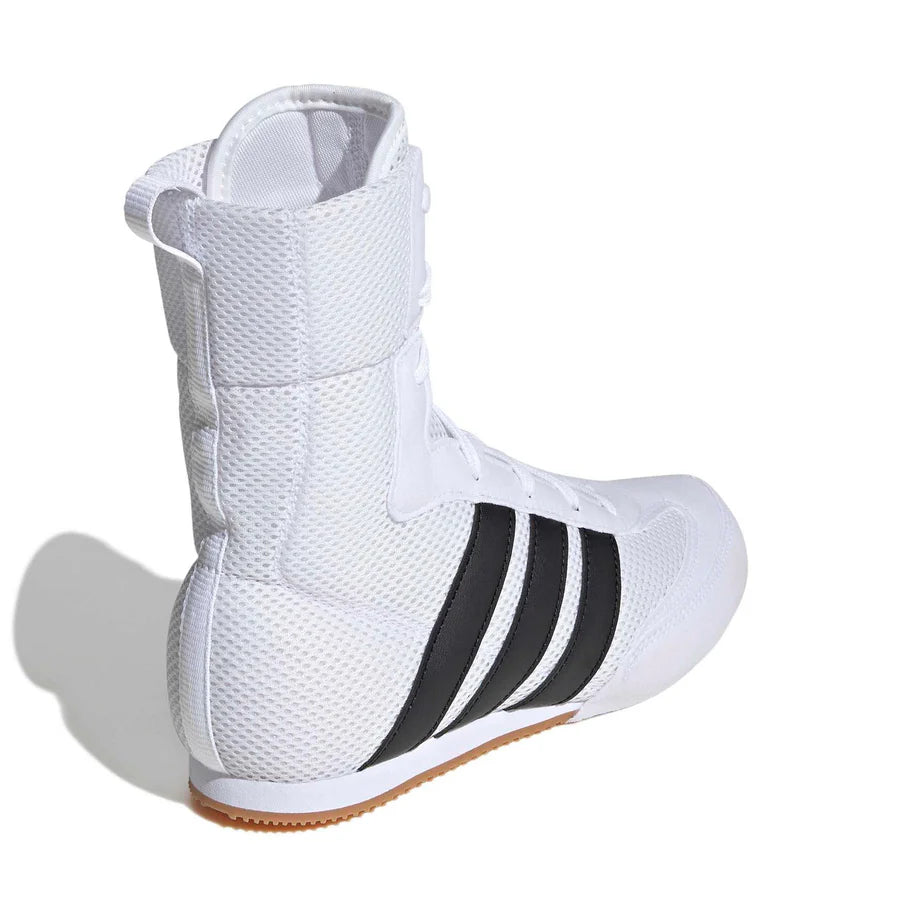 Child athlete Adidas Box Hog Classic K boxing boots during training