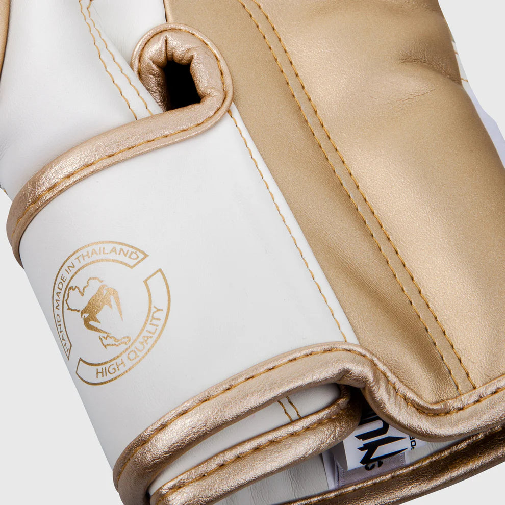 Boxing gloves with reinforced seams, ergonomic fit, and breathable mesh panels.