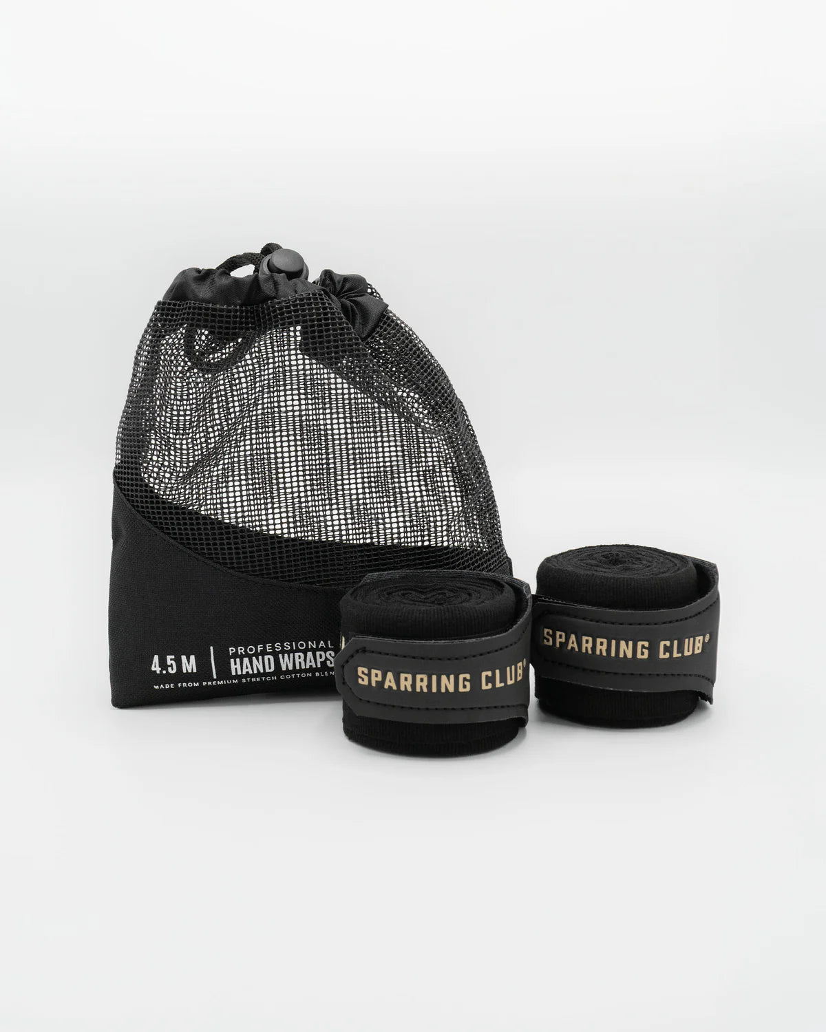 Patent-pending hook and loop thumb loop close-up on Boxraw 4.5m Sparring Club Hand Wraps Black Gold
