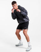 Side view of Boxraw Genaro Oversized Windbreaker Hoodie Black showing oversized relaxed fit
