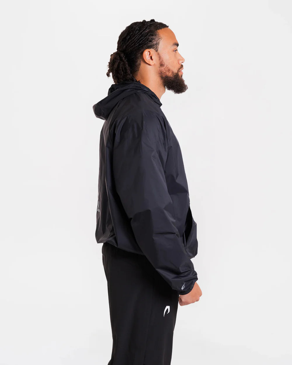 Side view of Boxraw Genaro Zip Up Windbreaker Black showing relaxed fit for boxing training and lifestyle wear