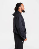Side view of Boxraw Genaro Zip Up Windbreaker Black showing relaxed fit for boxing training and lifestyle wear