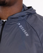 Reflective shoulder and back logo detail on Boxraw Genaro Zip Up Windbreaker Charcoal