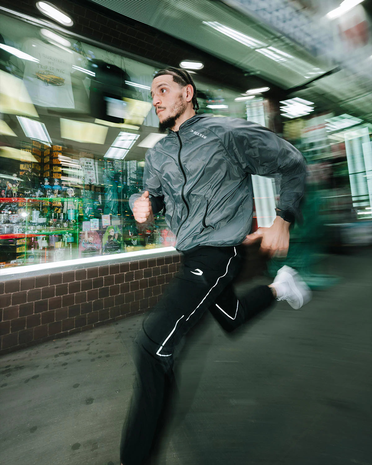 Boxraw Genaro Zip Up Windbreaker Charcoal worn for boxing roadwork gym training travel and combat sports lifestyle wear
