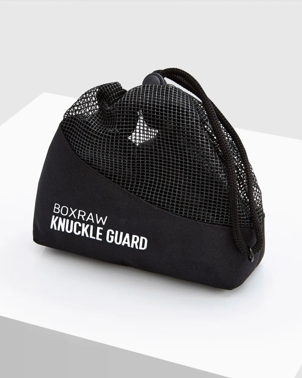 BOXRAW Knuckle Guards with hand wraps and boxing gloves prepared for training