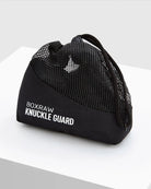 BOXRAW Knuckle Guards with hand wraps and boxing gloves prepared for training