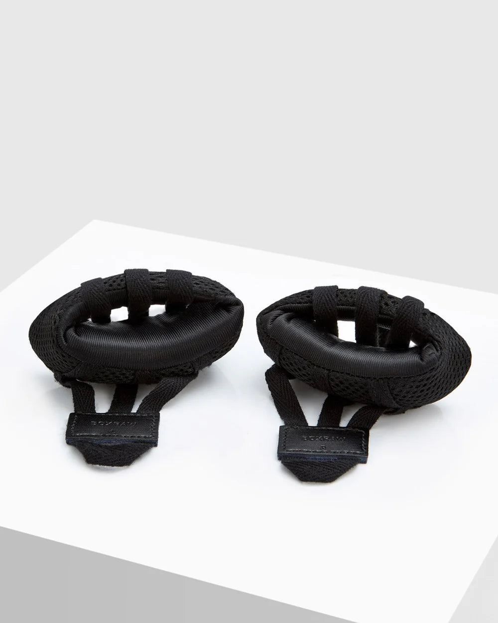 Japanese high-density foam, spacer fabric and leather patch detail on BOXRAW Knuckle Guards