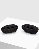 BOXRAW Knuckle Guards attached to boxing hand wraps during wrapping process