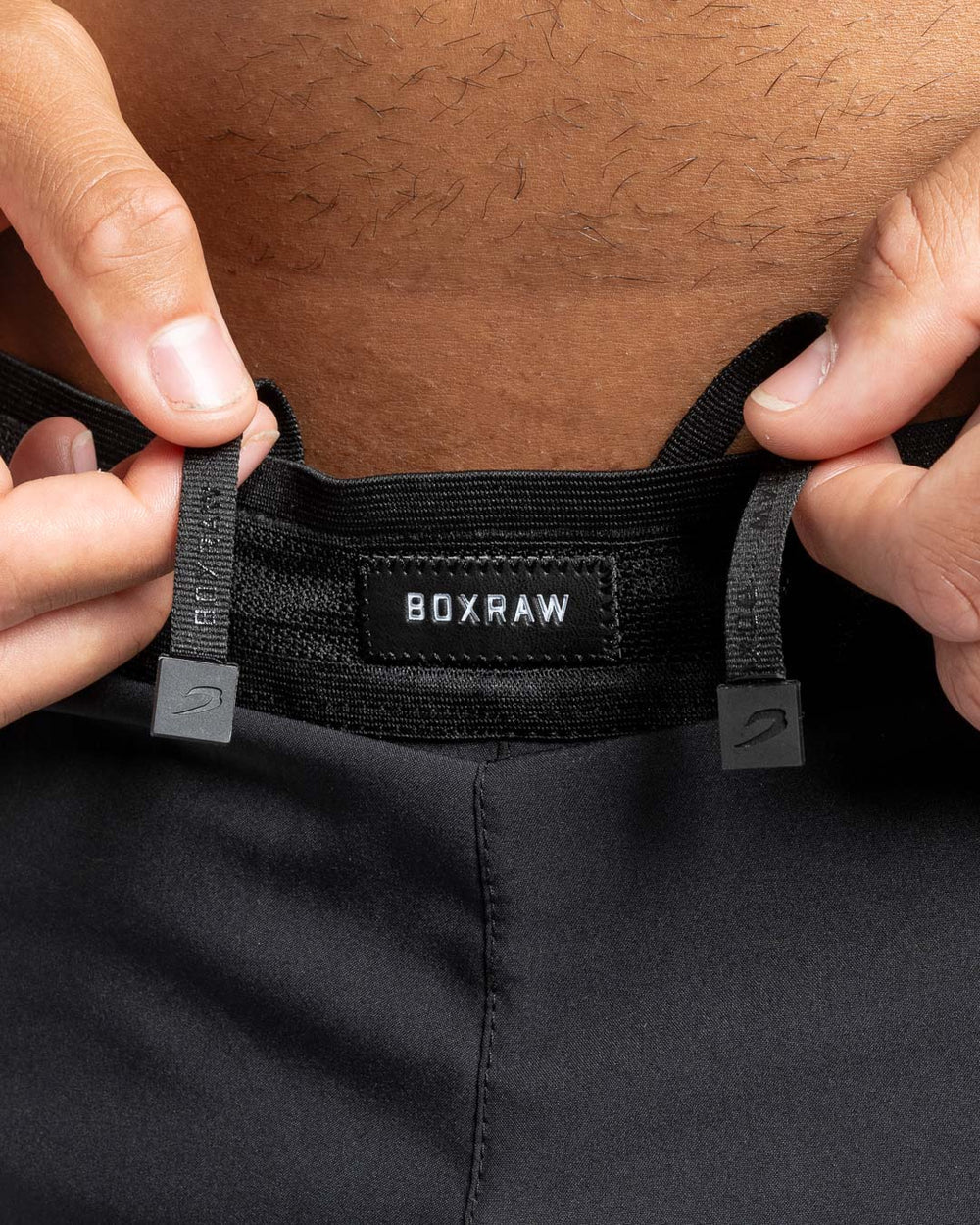 Adjustable ventilated waistband close-up on Boxraw Tunero 2-in-1 Shorts Black