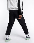 Back view of Boxraw Tunero Track Bottoms Black with laser perforated ventilation panel