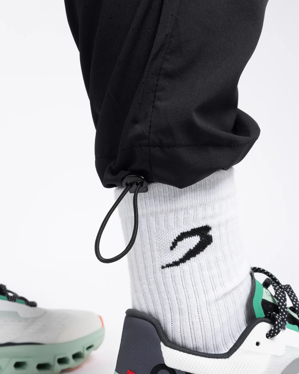 Adjustable elasticated ankle cuff detail on Boxraw Tunero Track Bottoms Black
