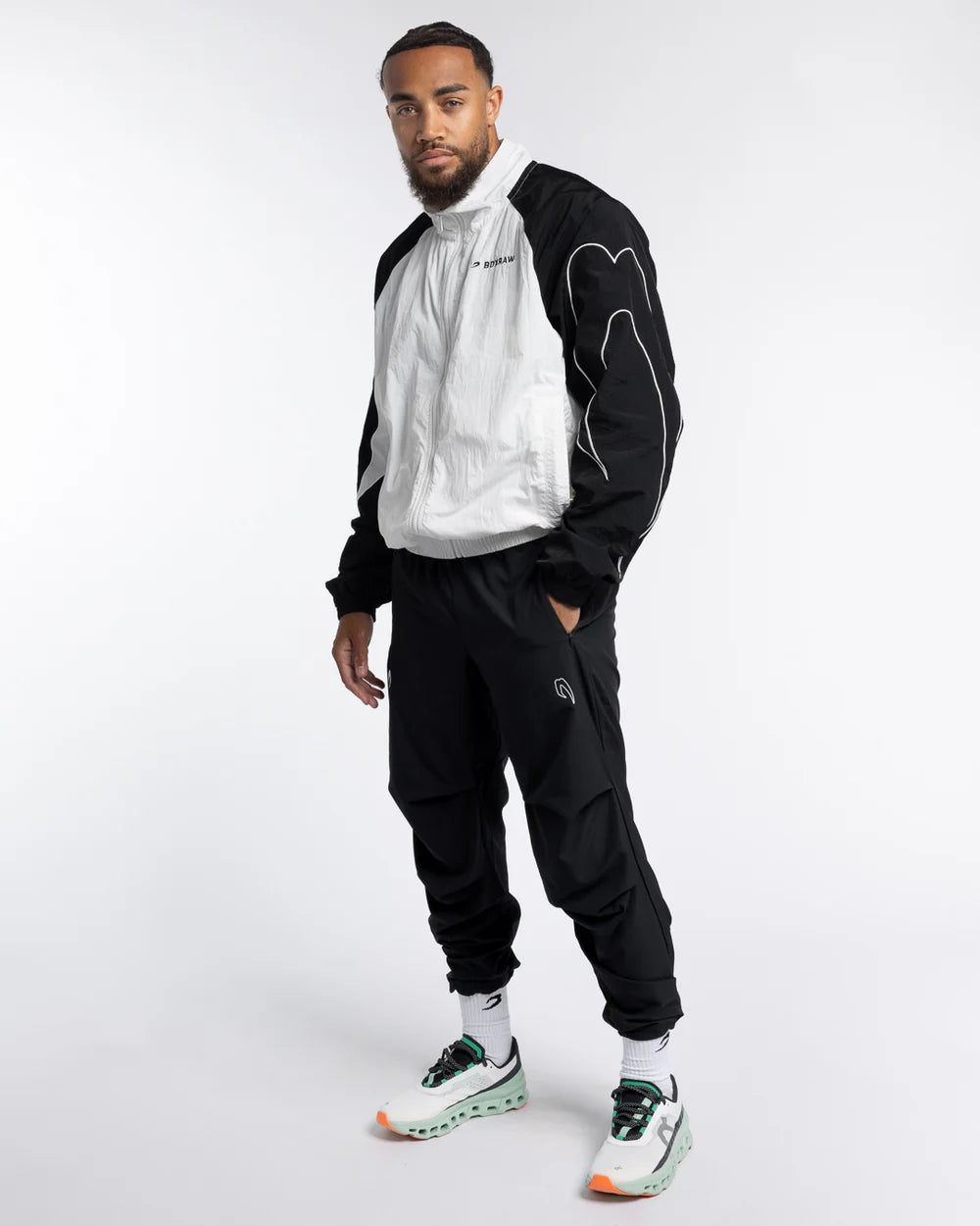 Boxraw Tunero Track Bottoms Black front view showing relaxed fit and lightweight SMRT-TEC fabric