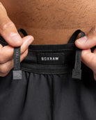 Adjustable ventilated waistband close-up on Boxraw Tunero Track Bottoms Black