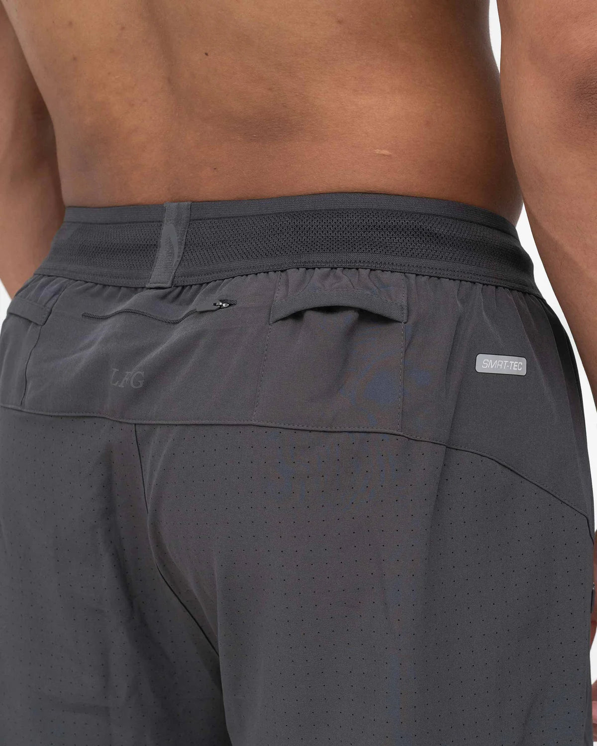 Back view of Boxraw Tunero Track Bottoms Charcoal with laser perforated ventilation panel