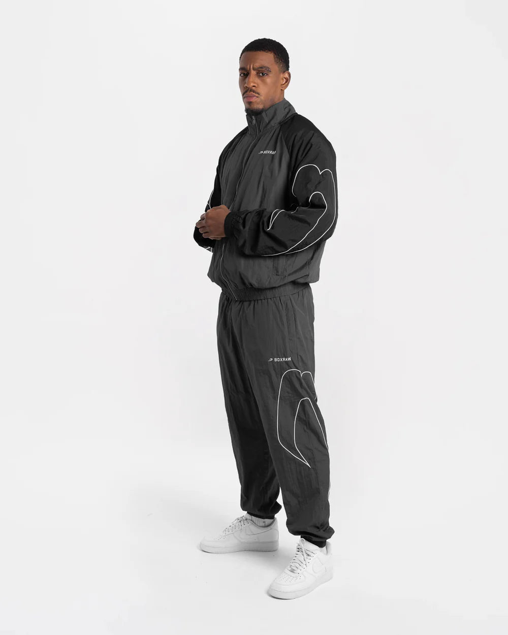 Full view of Boxraw Tunero Track Bottoms Grey showing Double Strike design