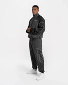 Full view of Boxraw Tunero Track Bottoms Grey showing Double Strike design