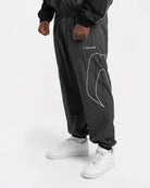 Boxraw Tunero Track Bottoms Grey front view showing relaxed fit and lightweight training design