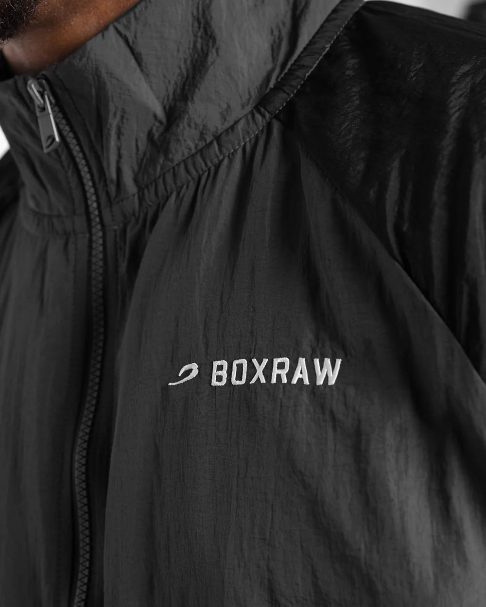 Embroidered BOXRAW LFG and sleeve Strike logo close-up on Boxraw Tunero Track Jacket Grey