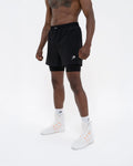Side view of Boxraw Valdes 2-in-1 Shorts Black showing outer shorts and compression leggings
