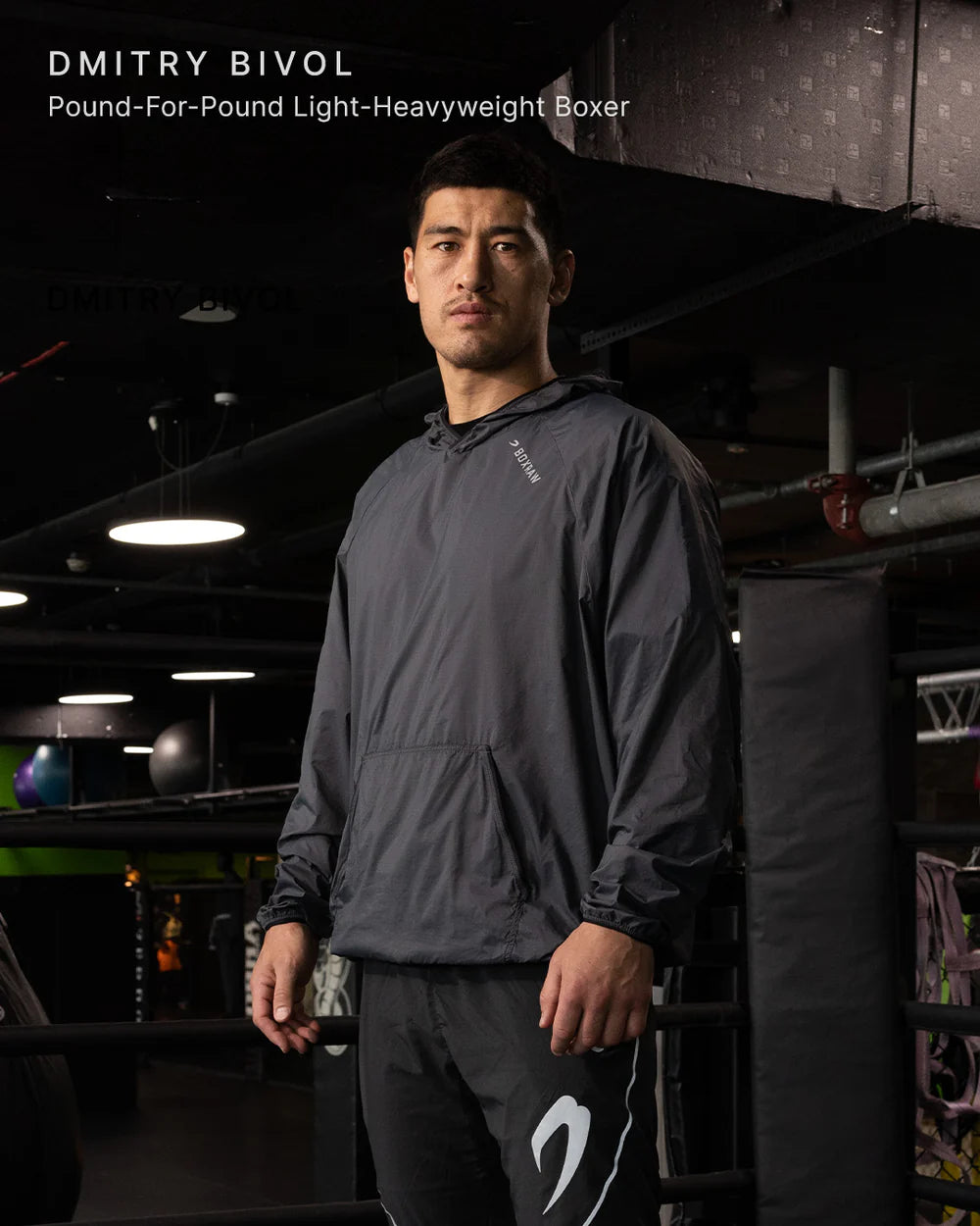 Dmitry Bivol wearing the Boxraw Genaro Oversized Windbreaker Hoodie Black in a lifestyle setting