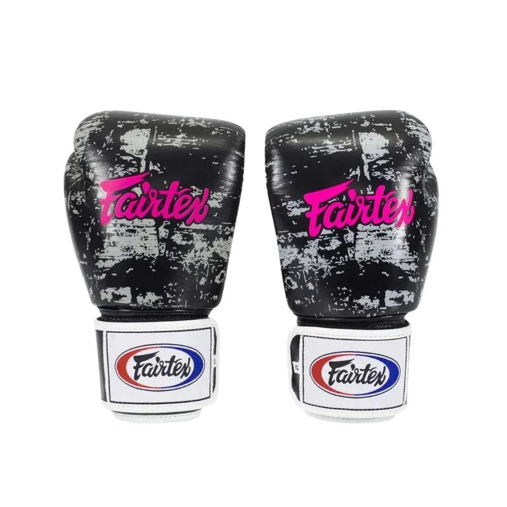 Angled pair of Fairtex BGV1 Dark Cloud boxing gloves showing the distressed Dark Cloud artwork and Fairtex branding