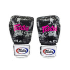 Angled pair of Fairtex BGV1 Dark Cloud boxing gloves showing the distressed Dark Cloud artwork and Fairtex branding
