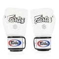 Side view of Fairtex BGV15 white boxing gloves showing contoured padding and double wrist strap.