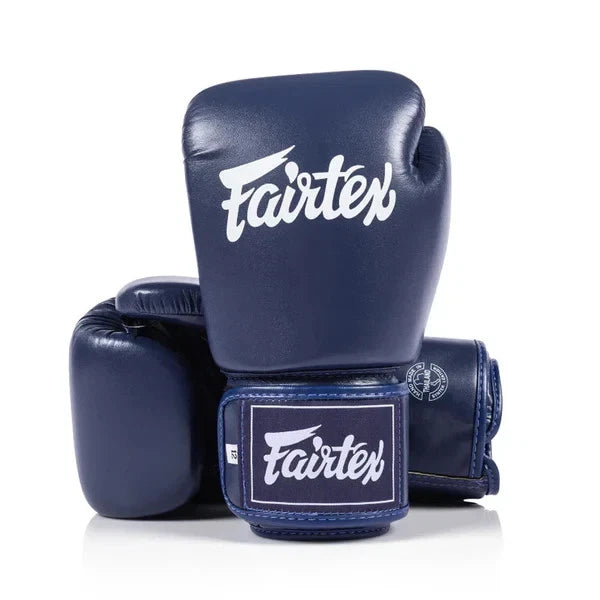 Fairtex blue boxing gloves back view
