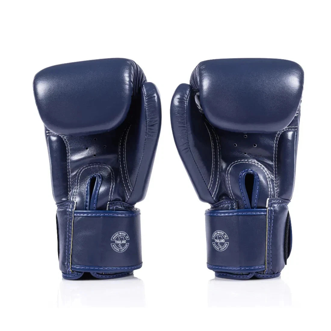 wrist strap detail on blue Fairtex boxing gloves