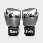 Side profile of Fairtex BGV1C-PLUS gloves showing ergonomic shape and wrist patch