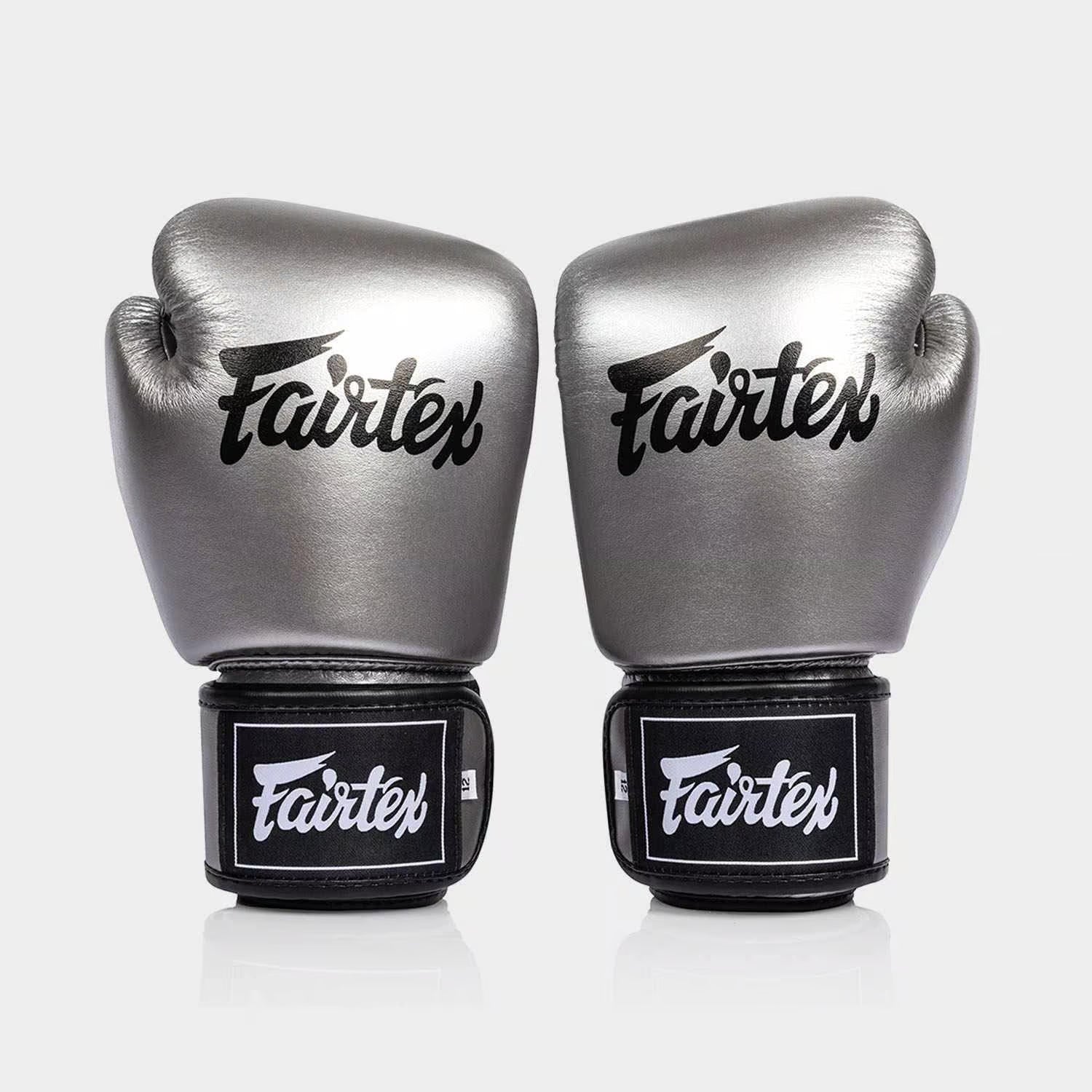 Side profile of Fairtex BGV1C-PLUS gloves showing ergonomic shape and wrist patch