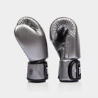 Fairtex BGV1C-PLUS microfibre gloves used during Muay Thai training in a boxing gym