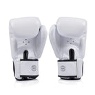 hook and loop wrist strap on white Fairtex gloves