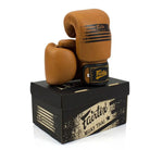 Fairtex BGV21 Legacy brown boxing gloves displayed with Fairtex branded Legacy packaging
