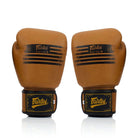 Fairtex BGV21 Legacy brown boxing gloves showing the front and palm sides with hook-and-loop wrist closure