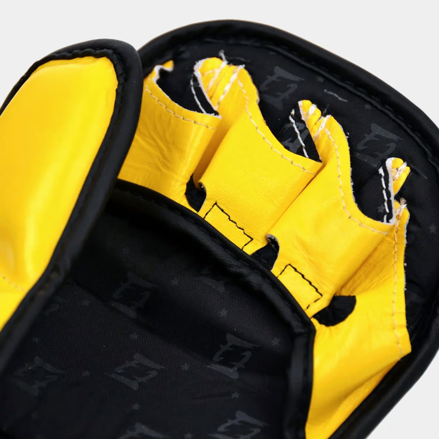 open palm design on yellow Fairtex MMA gloves