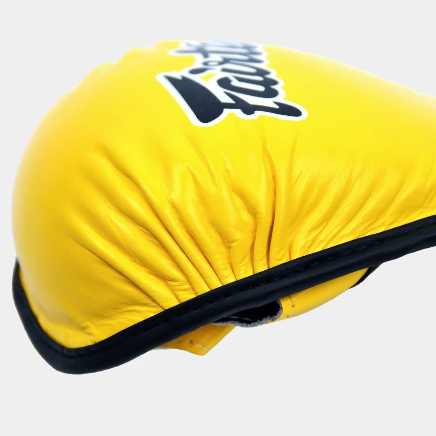 double wrist strap detail on yellow Fairtex gloves