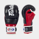 Wrap-around wrist strap and thumb padding close-up on Fairtex FGV18 MMA Gloves Black Red
