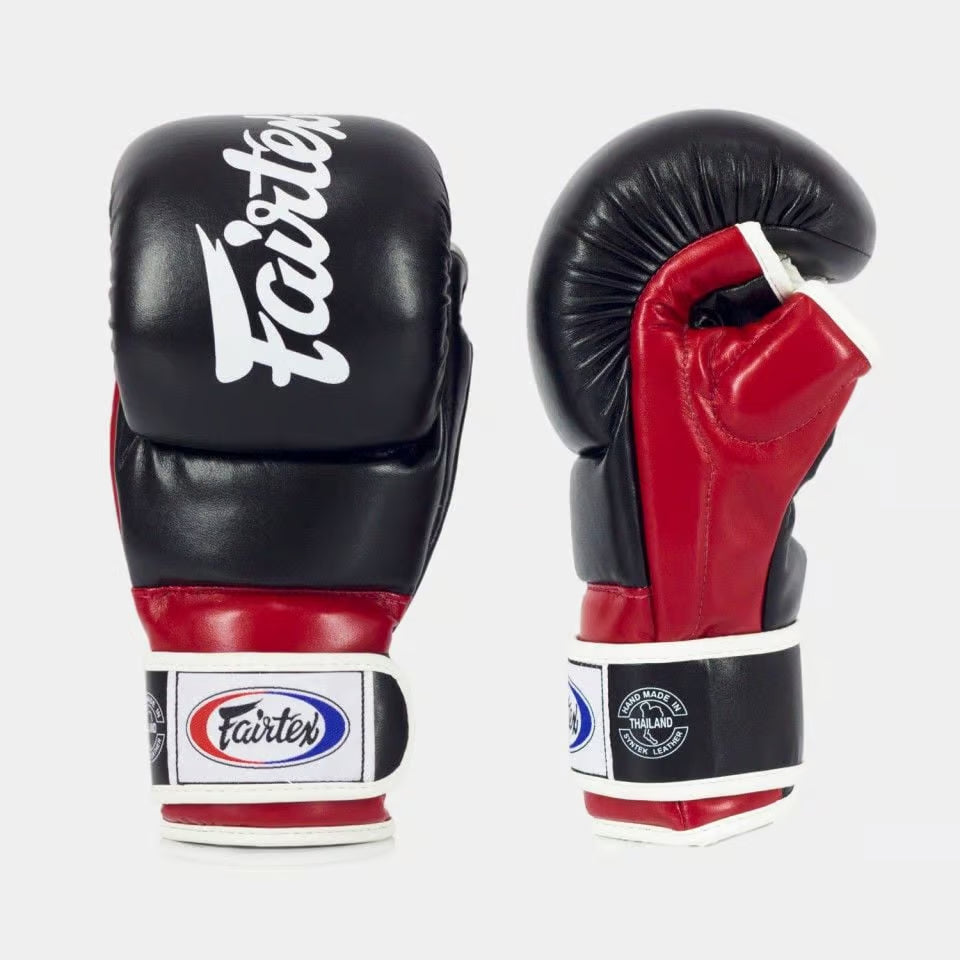 Wrap-around wrist strap and thumb padding close-up on Fairtex FGV18 MMA Gloves Black Red