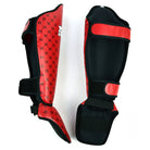 Fairtex red shin guards used in Muay Thai sparring session