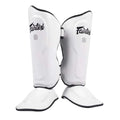 Fairtex Ultra Ergo Shin Guards in White shown from the front with contoured shin and extended toe sections visible