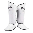 Fairtex Ultra Ergo Shin Guards in White shown from the front with contoured shin and extended toe sections visible