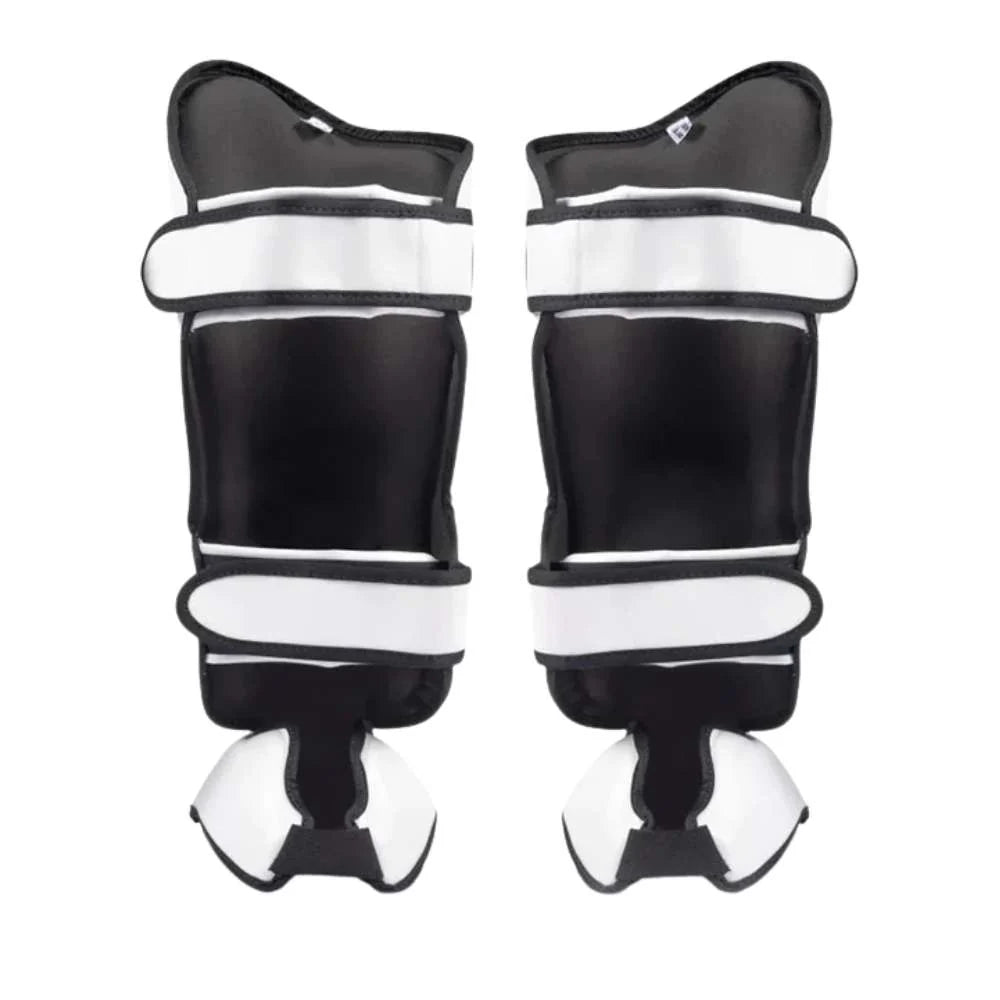 Rear angled view of White Fairtex Ultra Ergo Shin Guards showing the adjustable straps and contoured construction