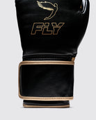 Signature Fly Icarus gold logo embossed on black vegan leather boxing gloves