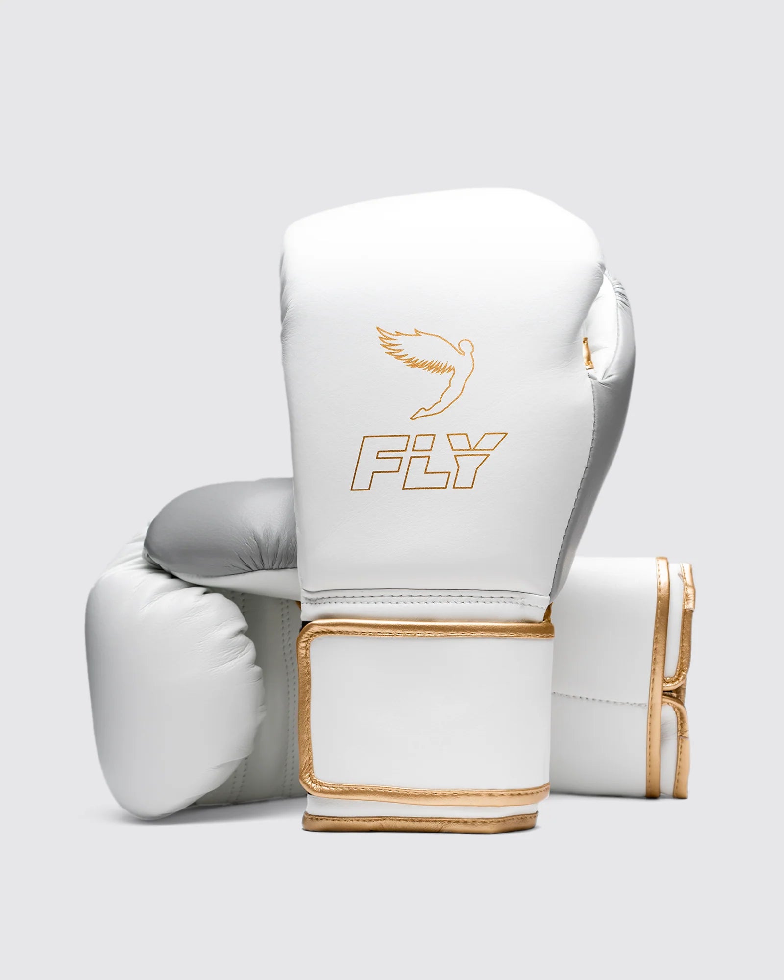Front view of Fly Superloop Pro X2 boxing gloves in white, grey, and gold showing premium vegan leather finish.